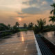 Sunset on solar panels in a village