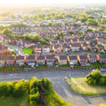 UK residential. An aerial view of a housing estate on the outskirts of the city of Glasgow, Scotland.